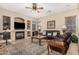 Cozy living room with a fireplace, comfortable seating, and a warm, inviting ambiance at 1963 E Monterey St, Chandler, AZ 85225