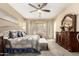 Bright main bedroom featuring neutral tones, large windows, and a stylish dresser at 1963 E Monterey St, Chandler, AZ 85225