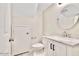 A half bath includes a sink, vanity, toilet, and storage at 215 W Mountain Sage Dr, Phoenix, AZ 85045
