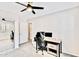 Bright bedroom featuring a work space and closet with mirrored doors, plus natural light at 215 W Mountain Sage Dr, Phoenix, AZ 85045