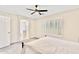 The bedroom has shuttered windows and an ensuite bathroom at 215 W Mountain Sage Dr, Phoenix, AZ 85045