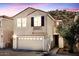 Charming two-story home featuring a tile roof and attached two-car garage at 215 W Mountain Sage Dr, Phoenix, AZ 85045