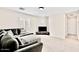 The expansive living room includes a large couch and TV at 215 W Mountain Sage Dr, Phoenix, AZ 85045