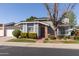 Charming single-story home with brick accents, manicured landscaping, and a welcoming front entrance, showing great curb appeal at 222 E Danbury Rd, Phoenix, AZ 85022
