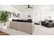 Spacious living room features a cozy fireplace, shiplap wall accents, and ample seating for relaxation and gatherings at 222 E Danbury Rd, Phoenix, AZ 85022