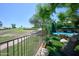 Beautiful backyard with golf course views, turf grass, a pool, and lounge chairs for relaxation under the sun at 22364 N 59Th Ln, Glendale, AZ 85310