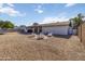Large backyard featuring a gravel landscape with an outdoor seating area perfect for enjoying the outdoors at 224 N 58Th St, Mesa, AZ 85205