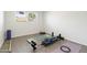 Well-lit home gym featuring exercise mats and equipment at 224 N 58Th St, Mesa, AZ 85205