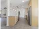 Bright kitchen showcasing custom cabinetry, stainless steel appliances, and a functional island at 224 N 58Th St, Mesa, AZ 85205