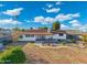 Aerial view of backyard featuring patio, desert landscaping, and white exterior at 2261 E Decatur St, Mesa, AZ 85213
