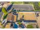 Aerial view of property featuring backyard oasis, adjacent sports field and vacant land at 2261 E Decatur St, Mesa, AZ 85213