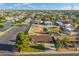 Aerial view of the property, including adjacent vacant land and neighborhood at 2261 E Decatur St, Mesa, AZ 85213