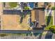 Aerial view showcasing the property's full backyard, pool, fire pit, and potential for a tennis court at 2261 E Decatur St, Mesa, AZ 85213
