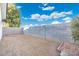 Private backyard featuring a block fence and simple landscaping offering ample space for outdoor activities at 2261 E Decatur St, Mesa, AZ 85213