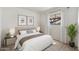 Relaxing bedroom boasting stylish decor, soft carpet, a window overlooking the street, and soft neutral tones at 2261 E Decatur St, Mesa, AZ 85213