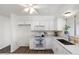 Clean kitchen features modern countertops, white cabinets, and stainless steel appliances at 2261 E Decatur St, Mesa, AZ 85213