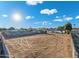 A large lot with room to build featuring dirt and blue skies at 2261 E Decatur St, Mesa, AZ 85213