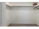 Walk-in closet includes a shelf for storing accessories at 2261 E Decatur St, Mesa, AZ 85213