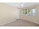 Bedroom with a ceiling fan and a window that provides natural light at 2620 E Rustling Oaks Ln, Phoenix, AZ 85024