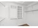 Walk-in closet with built-in shelving and ample storage space at 2620 E Rustling Oaks Ln, Phoenix, AZ 85024