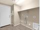 Laundry Room features shelving, tile floors, and washer/dryer hook-ups at 2620 E Rustling Oaks Ln, Phoenix, AZ 85024