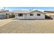Charming single-story home with gravel front yard and covered carport for convenient parking at 3553 W El Camino Dr, Phoenix, AZ 85051