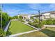 Expansive backyard with bocce court, pool, and beautifully landscaped grounds, perfect for outdoor entertaining at 4024 E Minton Cir, Mesa, AZ 85215