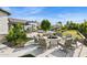Luxury backyard with firepit and seating area, perfect for gathering and relaxing with outdoor dining at 4024 E Minton Cir, Mesa, AZ 85215