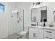 Contemporary bathroom featuring sleek shower, modern vanity and fixtures at 4024 E Minton Cir, Mesa, AZ 85215