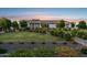 Beautiful single story home with a spacious front lawn and professionally landscaped yard at 4024 E Minton Cir, Mesa, AZ 85215