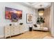 Comfortable sitting area with stylish chandelier and media center at 4024 E Minton Cir, Mesa, AZ 85215