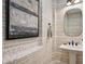 Stylish powder room featuring modern fixtures, decorative wallpaper, and a neutral color palette at 4024 E Minton Cir, Mesa, AZ 85215