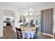 Eat in dining area with backyard views and access to the kitchen and living room at 4611 E Night Glow Dr, Cave Creek, AZ 85331