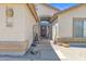 Inviting front gated entrance with a view of the front door with decor and seating area at 4611 E Night Glow Dr, Cave Creek, AZ 85331