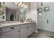 Bathroom features granite countertops, gray cabinetry, and a glass shower at 5328 S Wesley Cir, Mesa, AZ 85212