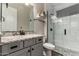 Bathroom featuring a modern vanity, a walk-in glass shower, and contemporary fixtures at 5328 S Wesley Cir, Mesa, AZ 85212