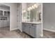 Bathroom features granite countertops and gray cabinetry, and neutral walls at 5328 S Wesley Cir, Mesa, AZ 85212