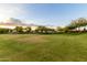 Expansive community green space perfect for outdoor activities and leisurely enjoyment at 5328 S Wesley Cir, Mesa, AZ 85212