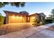 Beautiful home with a spacious three-car garage and a well-maintained brick driveway at 5328 S Wesley Cir, Mesa, AZ 85212