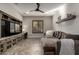 Living room featuring built-in storage and a large sectional at 5328 S Wesley Cir, Mesa, AZ 85212