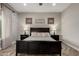 Comfortable main bedroom with decorative wallpaper and a ceiling fan at 5328 S Wesley Cir, Mesa, AZ 85212