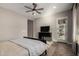 Bright main bedroom with access to outdoor patio and decorative lamps at 5328 S Wesley Cir, Mesa, AZ 85212