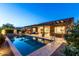 Beautiful backyard oasis featuring a pool, patio, and landscaped surroundings at 5328 S Wesley Cir, Mesa, AZ 85212