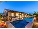 Stylish pool and spa area with a covered patio and outdoor seating at 5328 S Wesley Cir, Mesa, AZ 85212