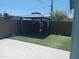 Cozy backyard featuring a gazebo and artificial grass, perfect for outdoor relaxation at 5539 N 31St Ln, Phoenix, AZ 85017