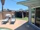 Backyard featuring a gazebo, artificial grass, patio, and chairs at 5539 N 31St Ln, Phoenix, AZ 85017