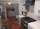 Well-equipped kitchen featuring stainless steel appliances, countertops, and tile backsplash at 5539 N 31St Ln, Phoenix, AZ 85017