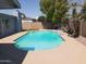 Backyard features a refreshing pool, patio and privacy wall at 5539 N 31St Ln, Phoenix, AZ 85017