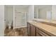 Full bathroom features vanity, shower and toilet with modern flooring at 5601 W Missouri Ave # 150, Glendale, AZ 85301