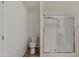 Bathroom includes shower with glass doors, a toilet and new flooring at 5601 W Missouri Ave # 150, Glendale, AZ 85301